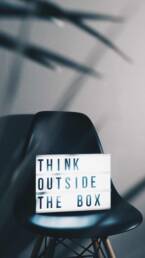 Think outside the box lightbox on chair